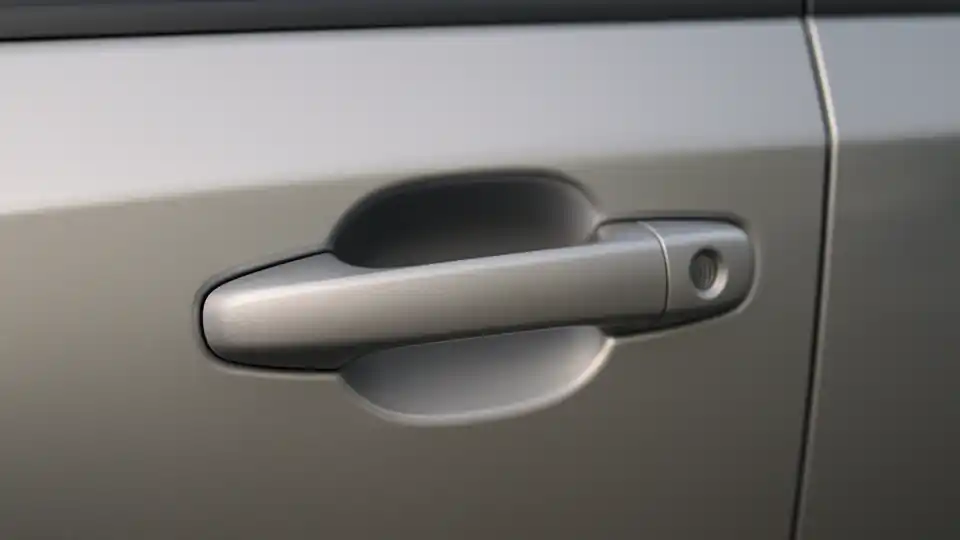 Close view of a car door handle and lock on a vehicle in Anna, TX
